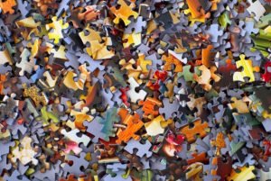 Scattered pieces of a jigsaw puzzle 